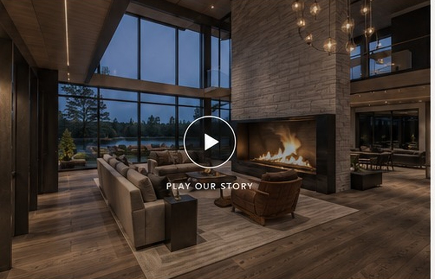 Luxury interior with stone fireplace and expansive glazing
